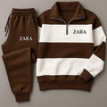 Brown and white Zara tracksuit on a gray background
